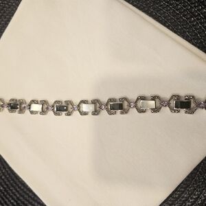 Marcasite sterling silver bracelet. Black onyx, mother of pearl and amethyst.
